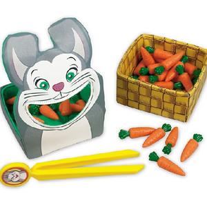 Large bunny face with open mouth, basket of orange plastic carrots, and yellow plastic tweezers.