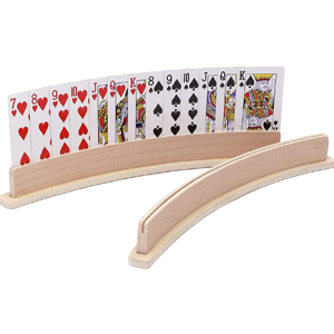 Wooden playing card holders that are curved holding cards upright.
